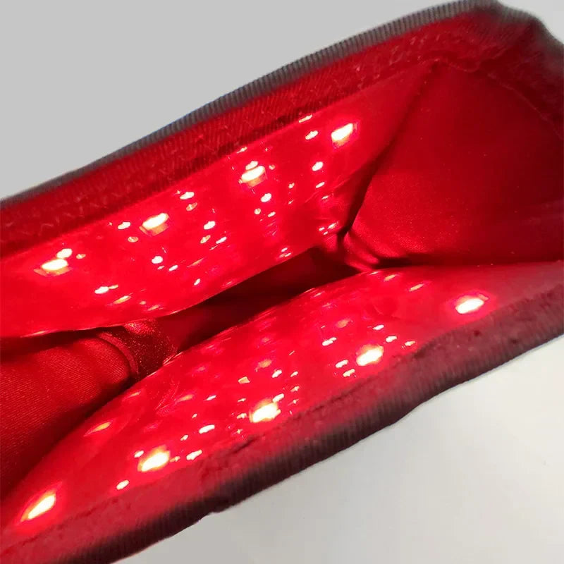 Lumera-Handschuh zur Linderung von Hand- und Gelenkschmerzen mit rotem Licht
