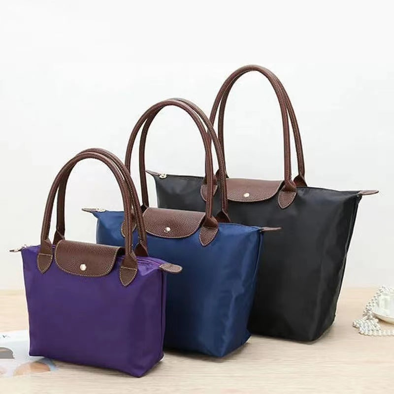 Elegance Tasche - Luxuriöse Griffe & Zeitloses Design
