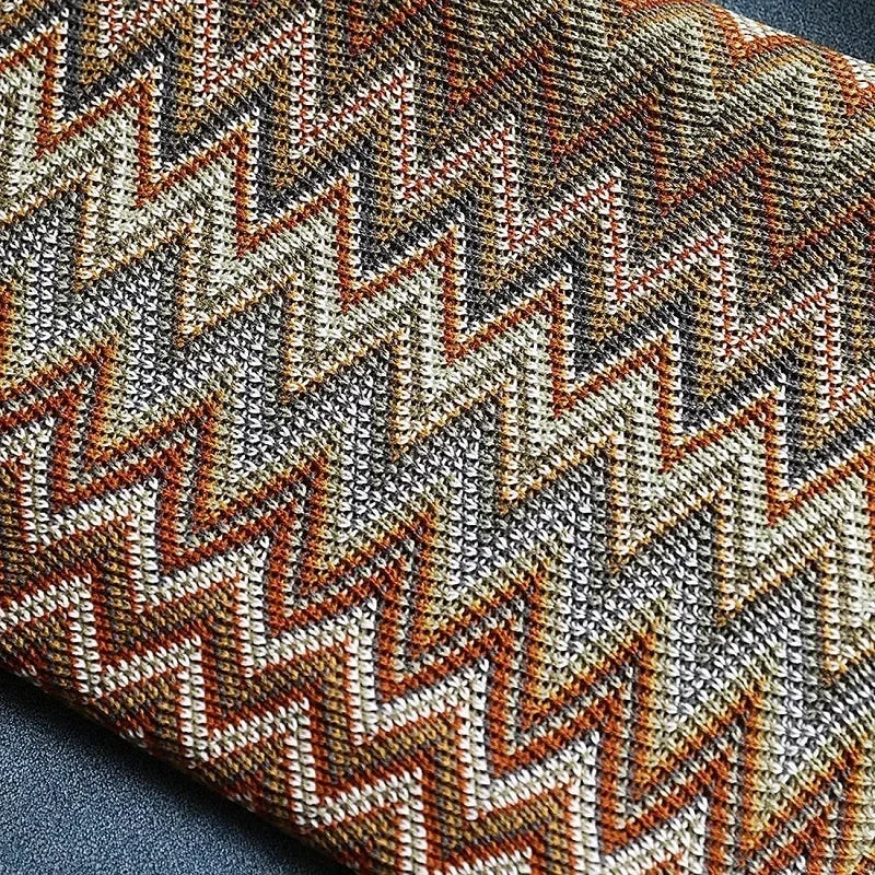 Boho Plaid mit Fransen – Weiche Decke mit Geometrischem Muster in Warmen Farben