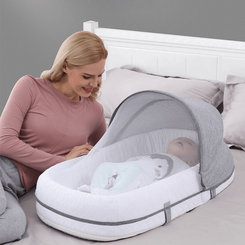 Mininest - Zusammenklappbares Reisebett für Babys